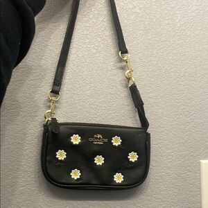Coach Black and White Crossbody Bag with Floral Embellishments